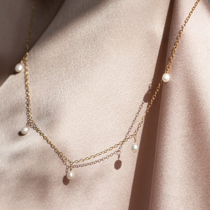 Gold pearl drops necklace