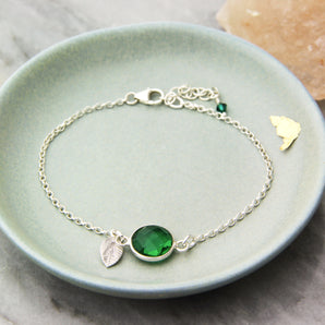 Close up view of May Birthstone And Initial Leaf Sterling Silver Bracelet