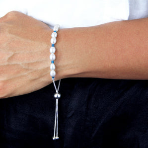December birthstone bracelet shown worn around a wrist