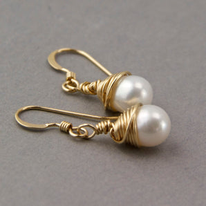 Close up view of Wrapped Teardrop Pearl Earrings