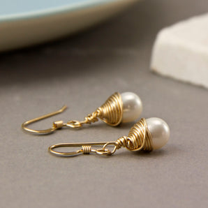 Close up view of Wrapped Teardrop Pearl Earrings