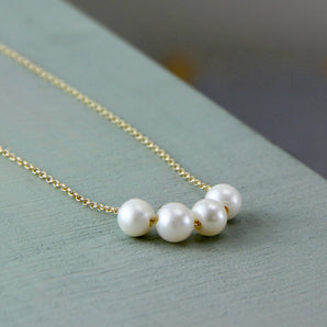 Close up view of Floating Pearls Special Milestone Birthday Necklace