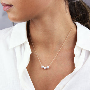 30th Birthday Pearl Necklace shown worn around a model's neck