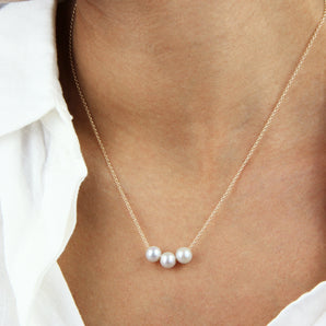 30th Birthday Pearl Necklace shown worn around a model's neck