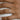 Skinny Sterling Silver Knot Ring on model's finger