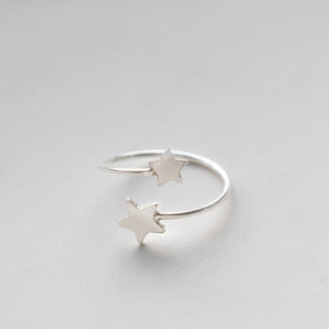 Sterling Silver Stars Crossover Skinny Ring displayed on a white background