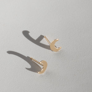 Close up view f Gold Filled Crescent Moon Stud Earrings