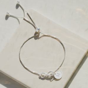 Delicate Sterling Silver Adjustable Sliding Bracelet with engraved disc charm