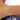 gold beaded chain bracelet on person's wrist