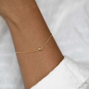 Model wearing 9ct Solid Gold Knot Bracelet