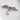 silver marcasite brooch with pearl against grey background