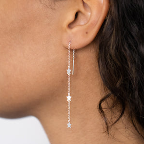 Model wearing Silver Stars Pull Through Threader Earrings