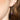 amethyst drop earrings on model's ear