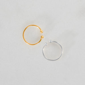 one gold and one silver Simple Ear Cuff Hoops