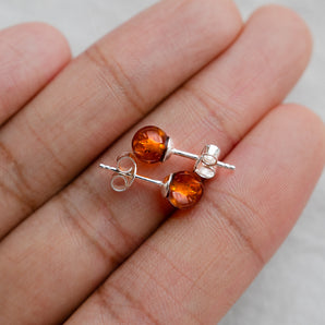 Close up view of Sterling Silver Amber Stud Earrings