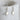 Silver star-shaped earrings on a white surface