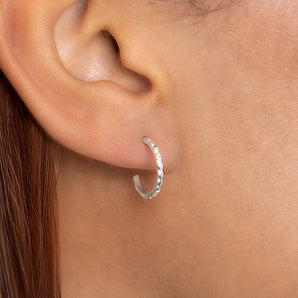 Close up view of Sterling Silver Textured Hoop Earrings