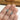 A hand holding Turquoise Hoop Earrings