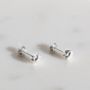 Close up view of Sterling Silver Molten Textured Stud Earrings