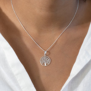 Model wearing Sterling Silver Tree Of Life Round Necklace