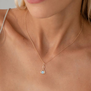 Model wearing Sterling Silver Infinity Ring Birthstone Necklace