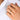 silver infinity ring on model's finger