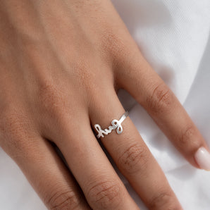 Sterling Silver Hug Open Adjustable Ring shown worn on a model's finger