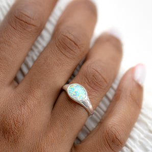 Sterling Silver Opal ring on model's finger